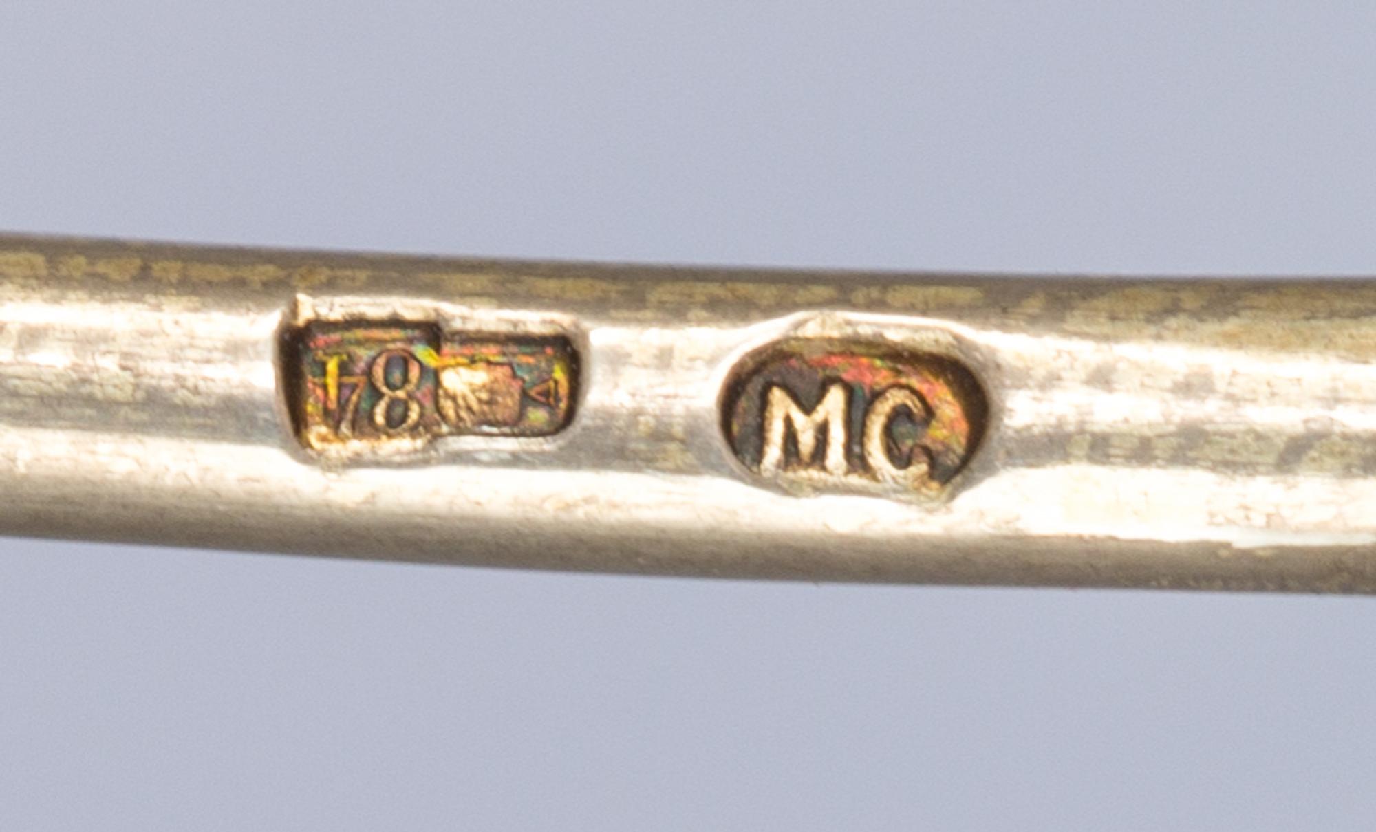 A Russian Silver-Gilt and Enamel Spoon, Mark of Maria Semenova, Moscow, early 20th century, having a green enameled spherical finial, t