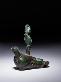 A Roman Bronze Oil Lamp in the Shape of a Dove with the Bust of a Goddess