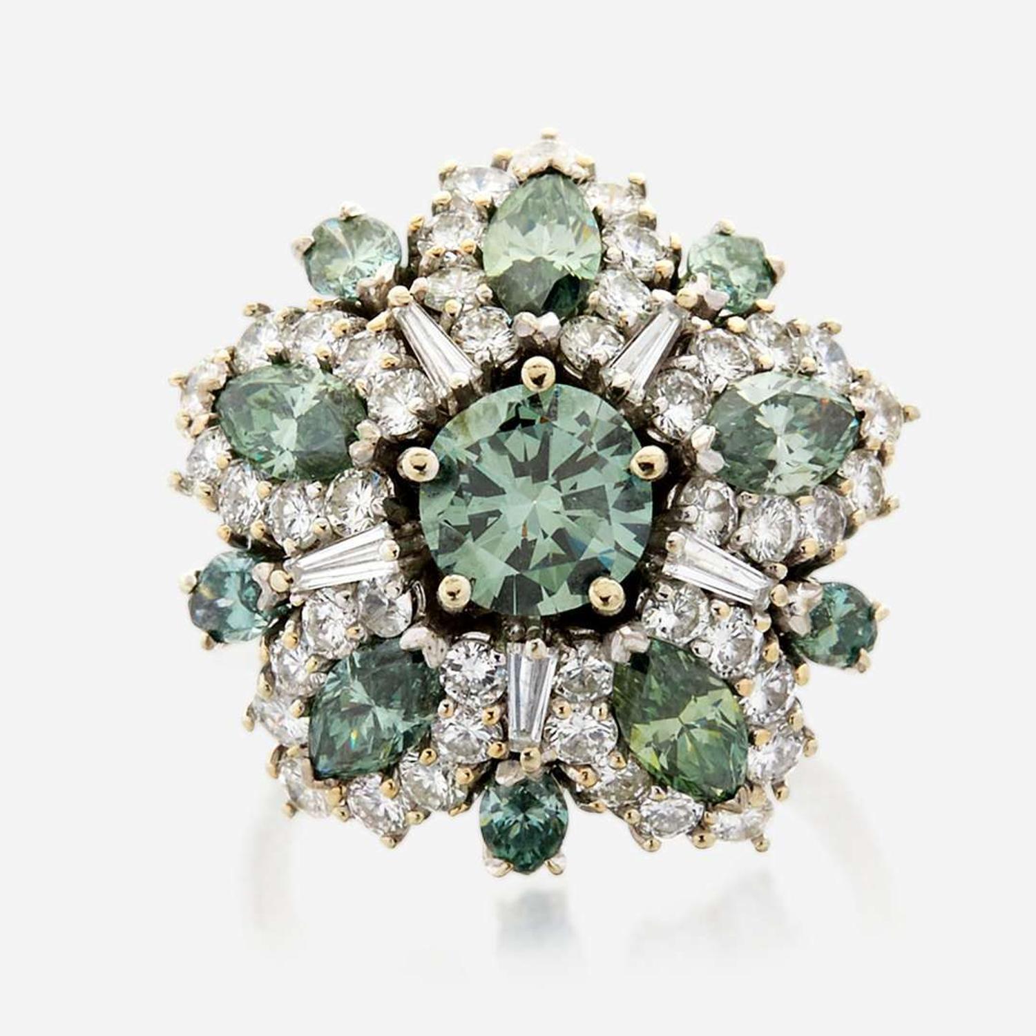 An irradiated green diamond, diamond, and white gold cocktail ring