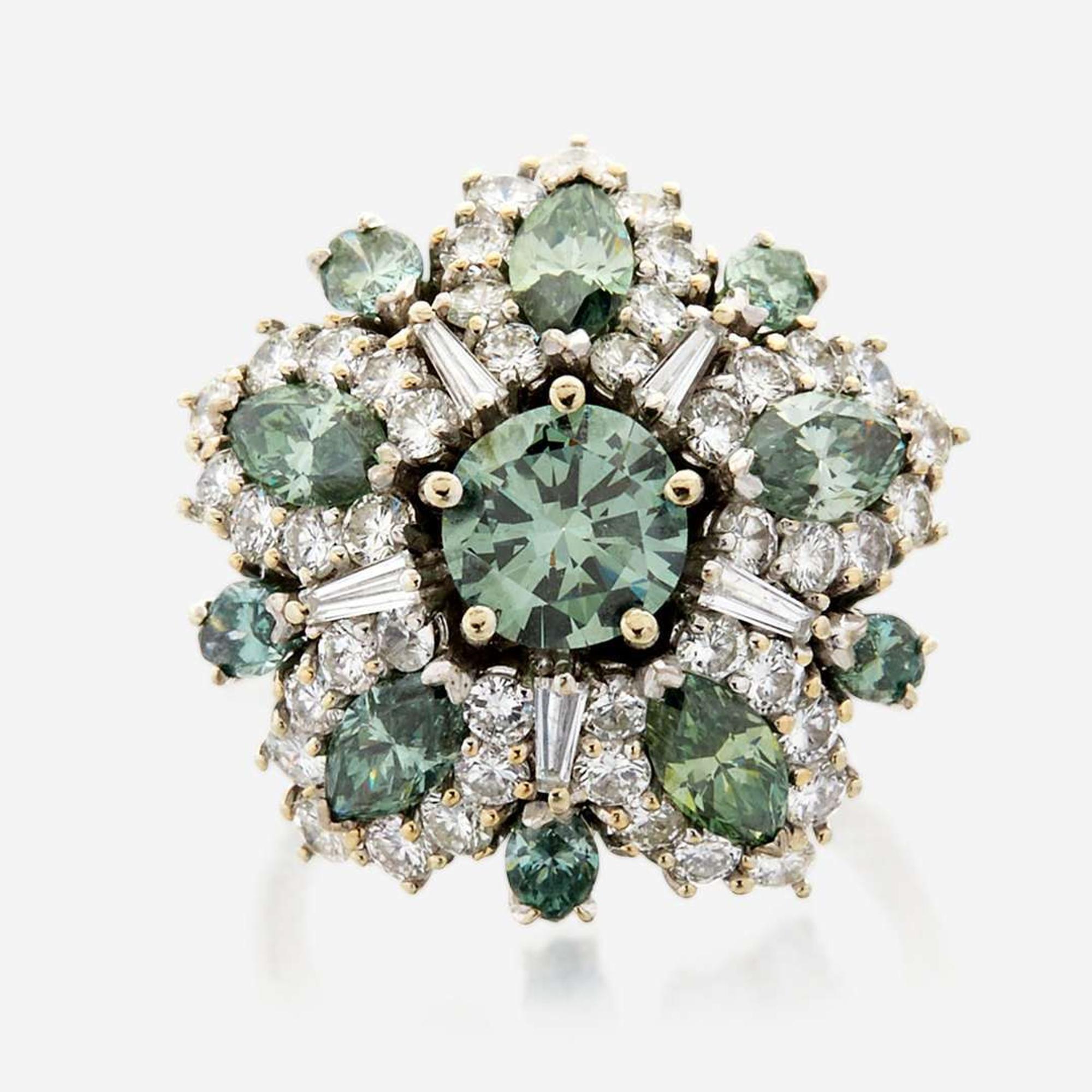 An irradiated green diamond, diamond, and white gold cocktail ring