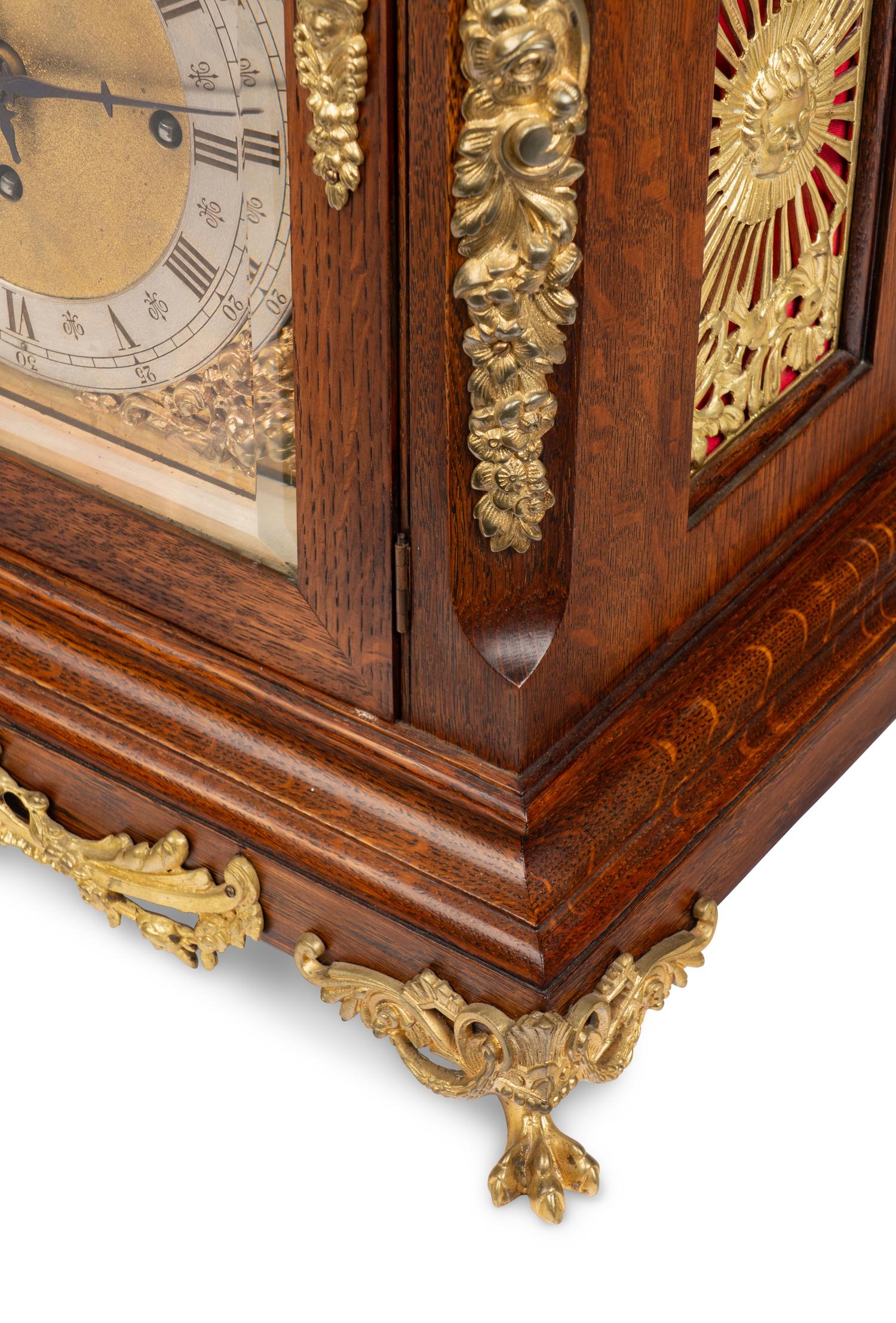 A George II Style Gilt Bronze Mounted Oak Bracket Clock