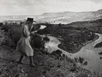 A group of four photographs ( O'Keeffe, Glen Canyon , 1961 (printed 1984); Georgia O'Keeffe Photographing the Chama River , 1961 (printed 1984); Untitled (O'Keeffe walking towards building) , 1960s; Untitled (O'Keeffe walking from building ), 1959 (printed 1984))