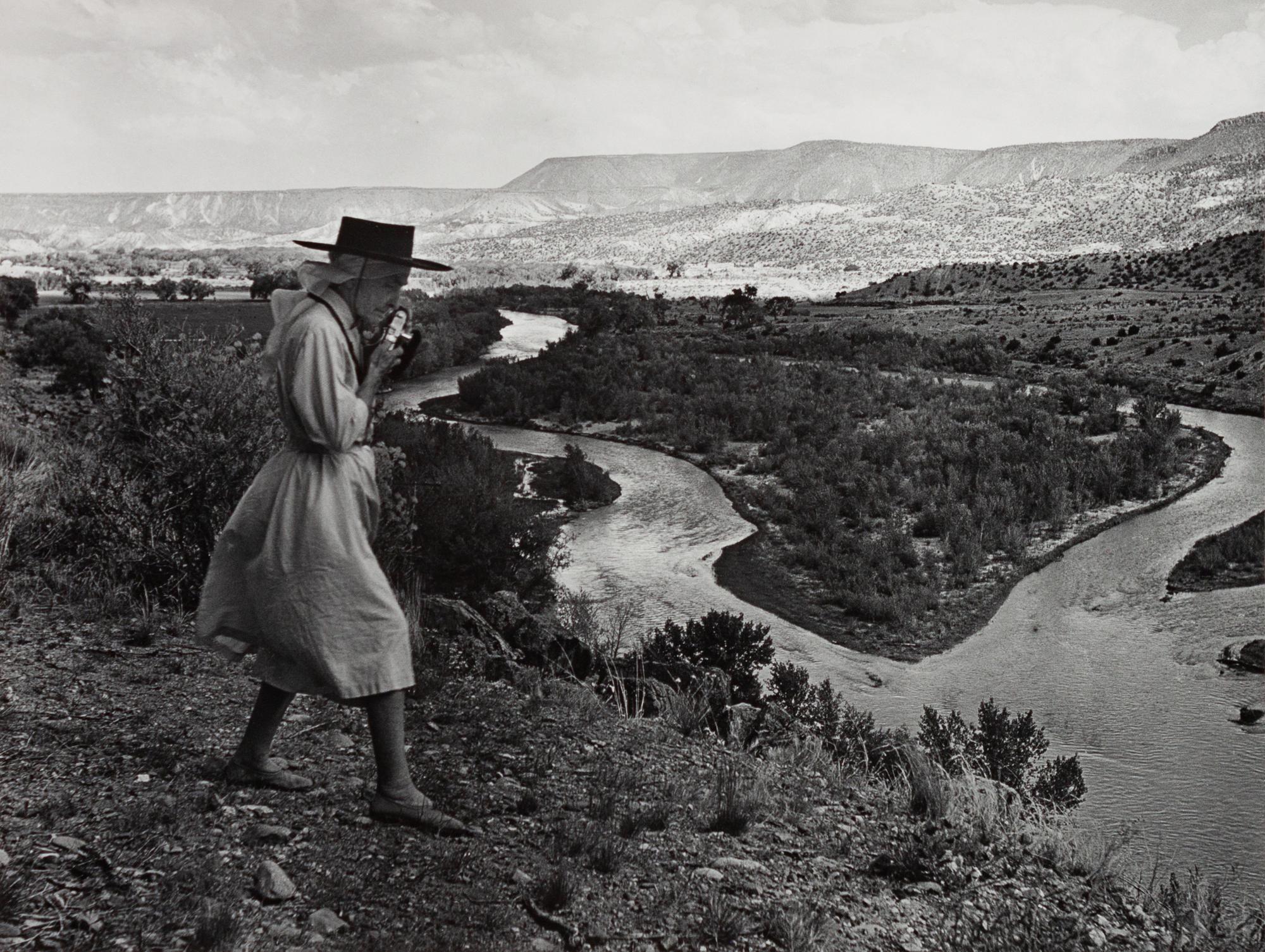 A group of four photographs ( O'Keeffe, Glen Canyon , 1961 (printed 1984); Georgia O'Keeffe Photographing the Chama River , 1961 (printed 1984); Untitled (O'Keeffe walking towards building) , 1960s; Untitled (O'Keeffe walking from building ), 1959 (printed 1984))