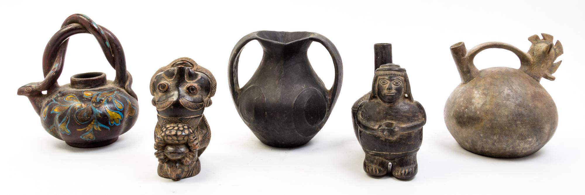 Two Pre-Columbian Style Pottery Stirrup Vessels Height of tallest 12 inches.