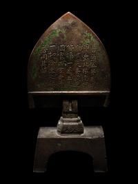 A Chinese Bronze Votive Figure of Buddha