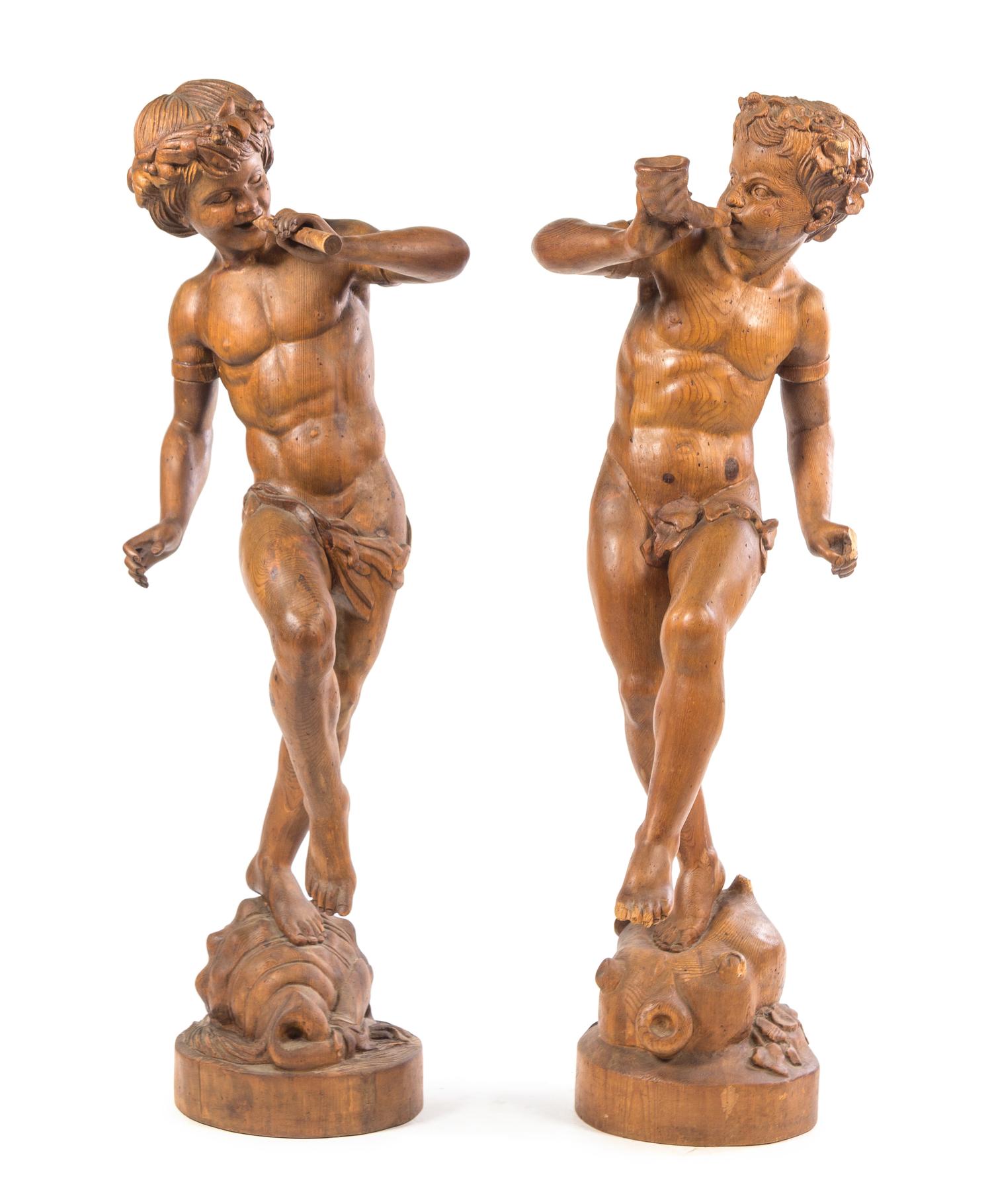 Two Continental Carved Wood Figures Height of taller 53 1/2 inches.