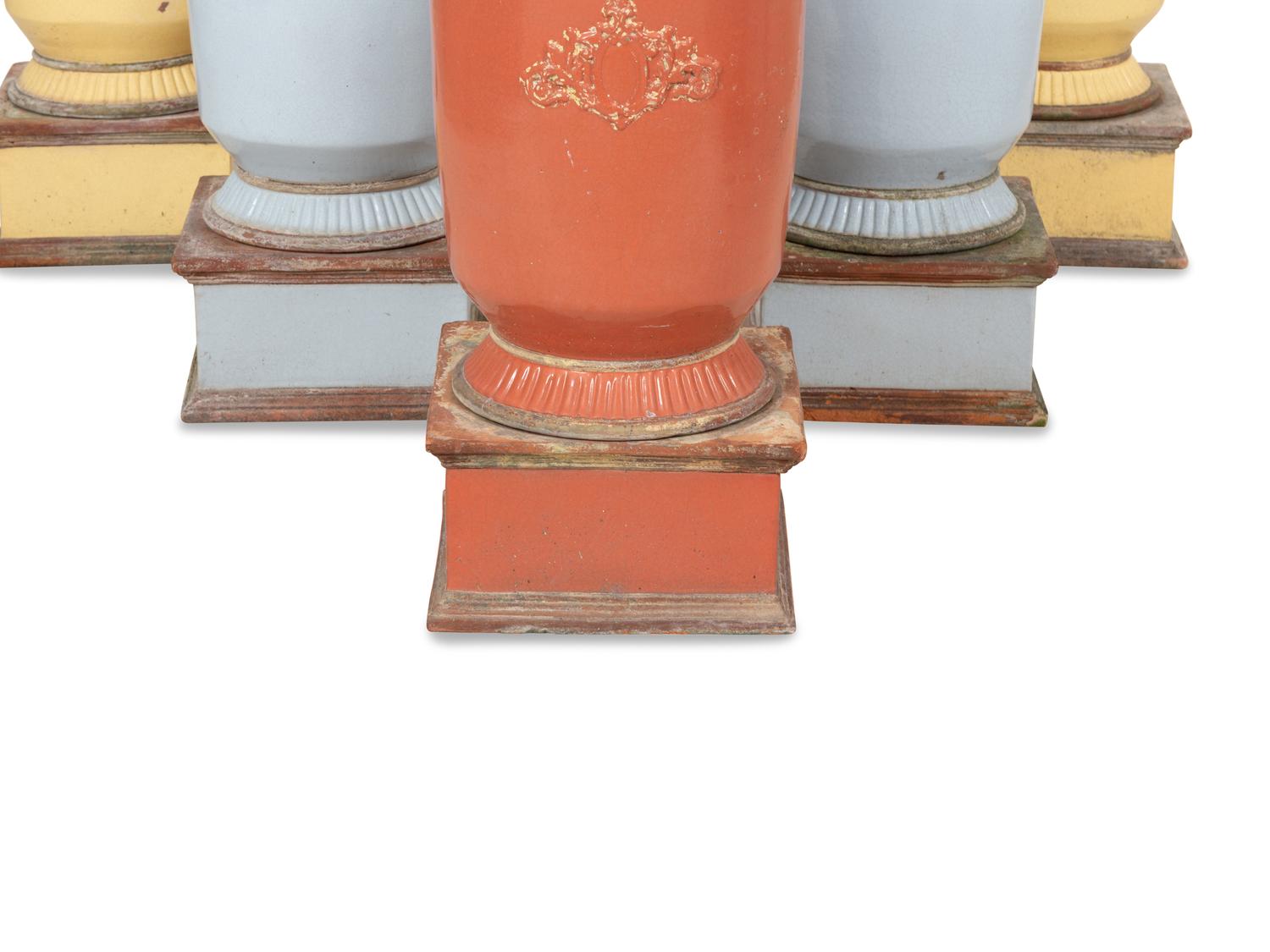 Three Pairs of Glazed Ceramic Palnters on Stands