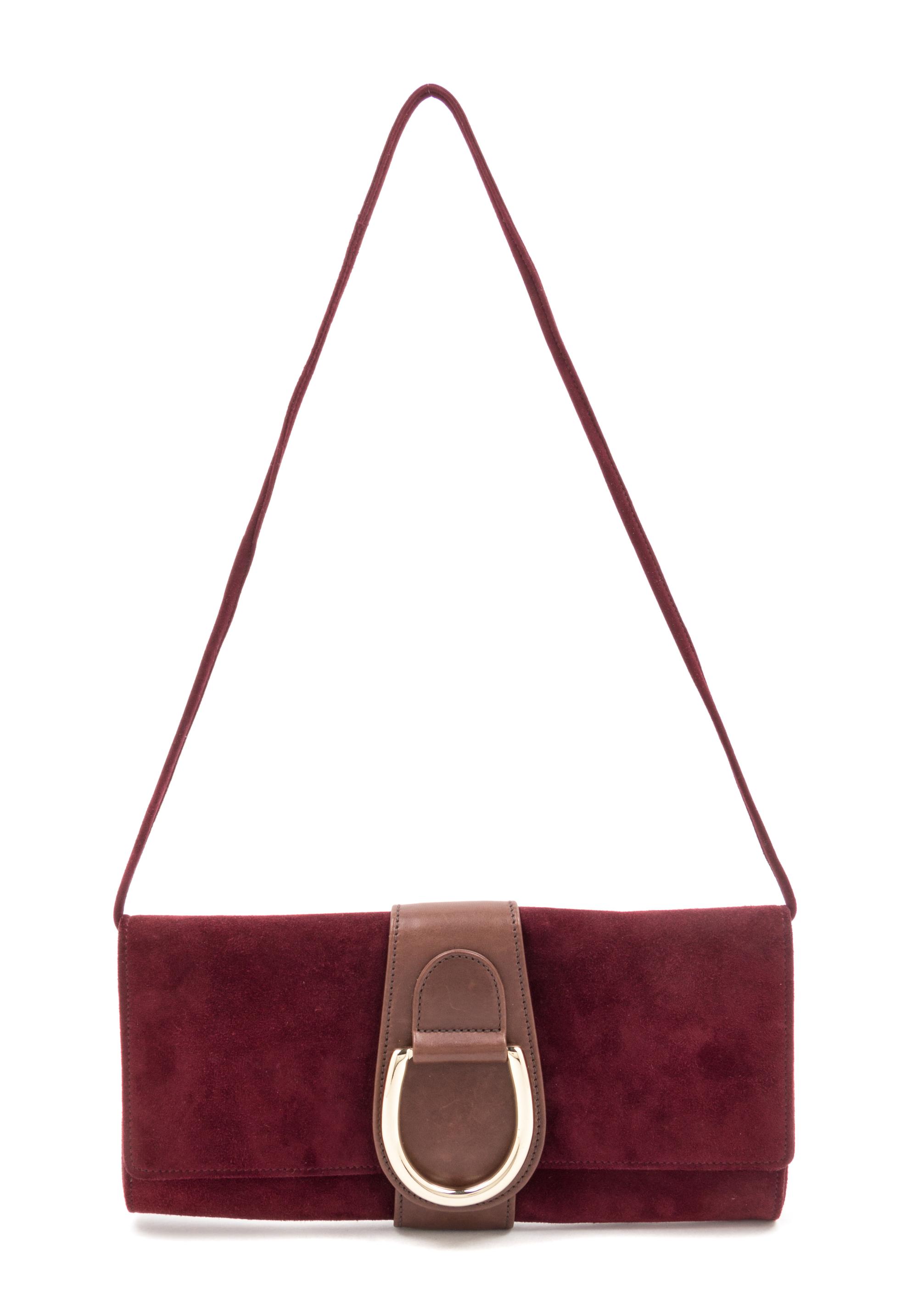 An Oscar de la Renta Bordeaux Suede Clutch, 10" x 5" x 1.25".