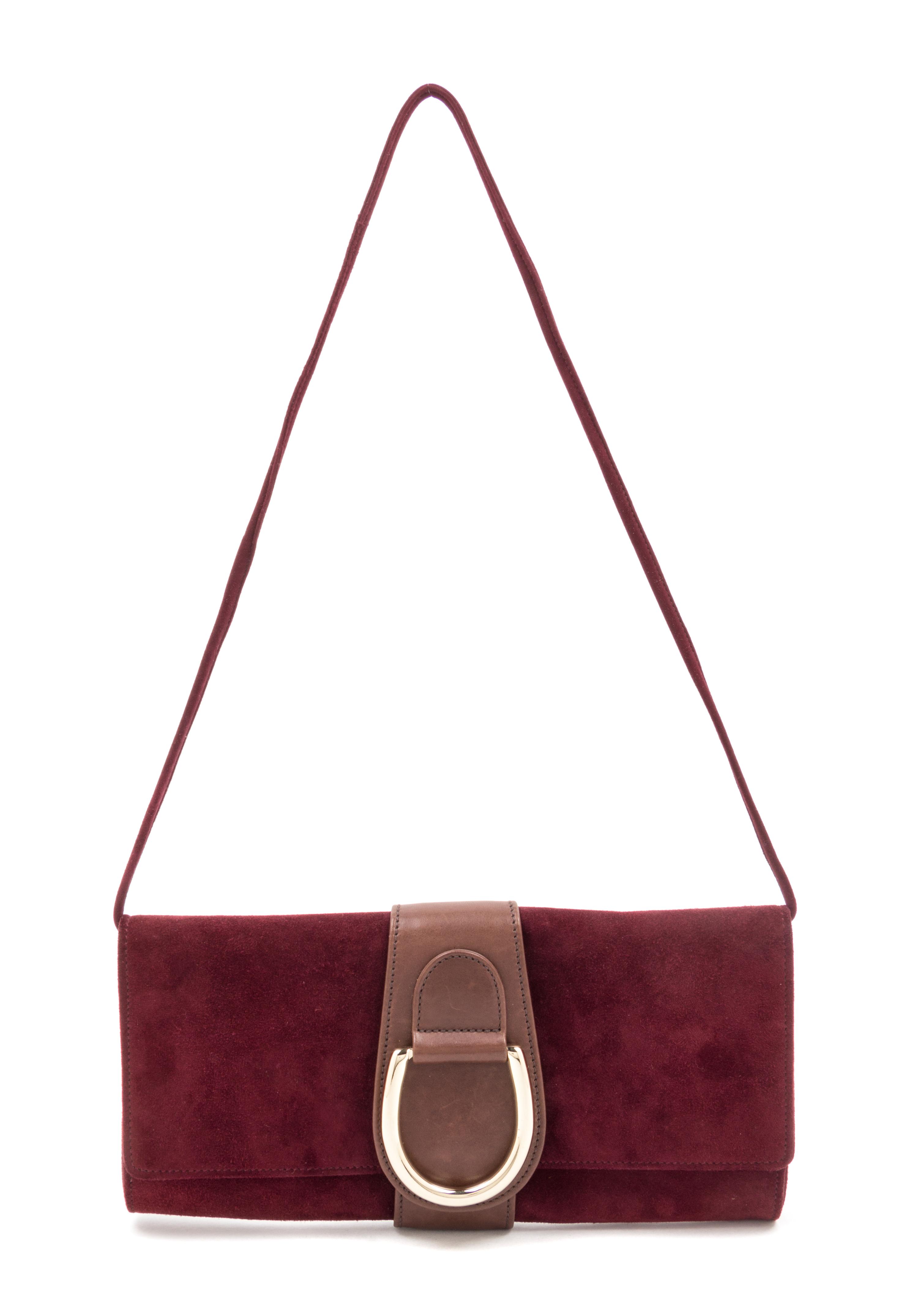 An Oscar de la Renta Bordeaux Suede Clutch, 10" x 5" x 1.25".