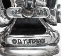 A Pair of Sterling Silver and 14 Karat Yellow Gold 'Buckle' Earclips, David Yurman, 10.30 dwts.