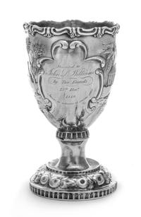 An American Silver Chalice, Canfield Bros. & Co., Baltimore, MD, 1849, the body worked to depict a tropical garden scene and an engrave