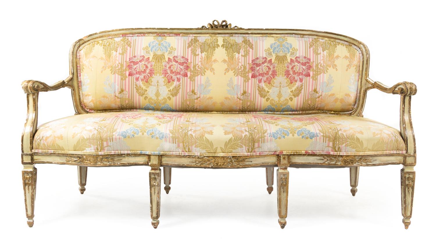 An Italian Painted and Parcel Gilt Settee Height 37 1/2 x width 69 x depth 23 inches. — 18TH CENTURY