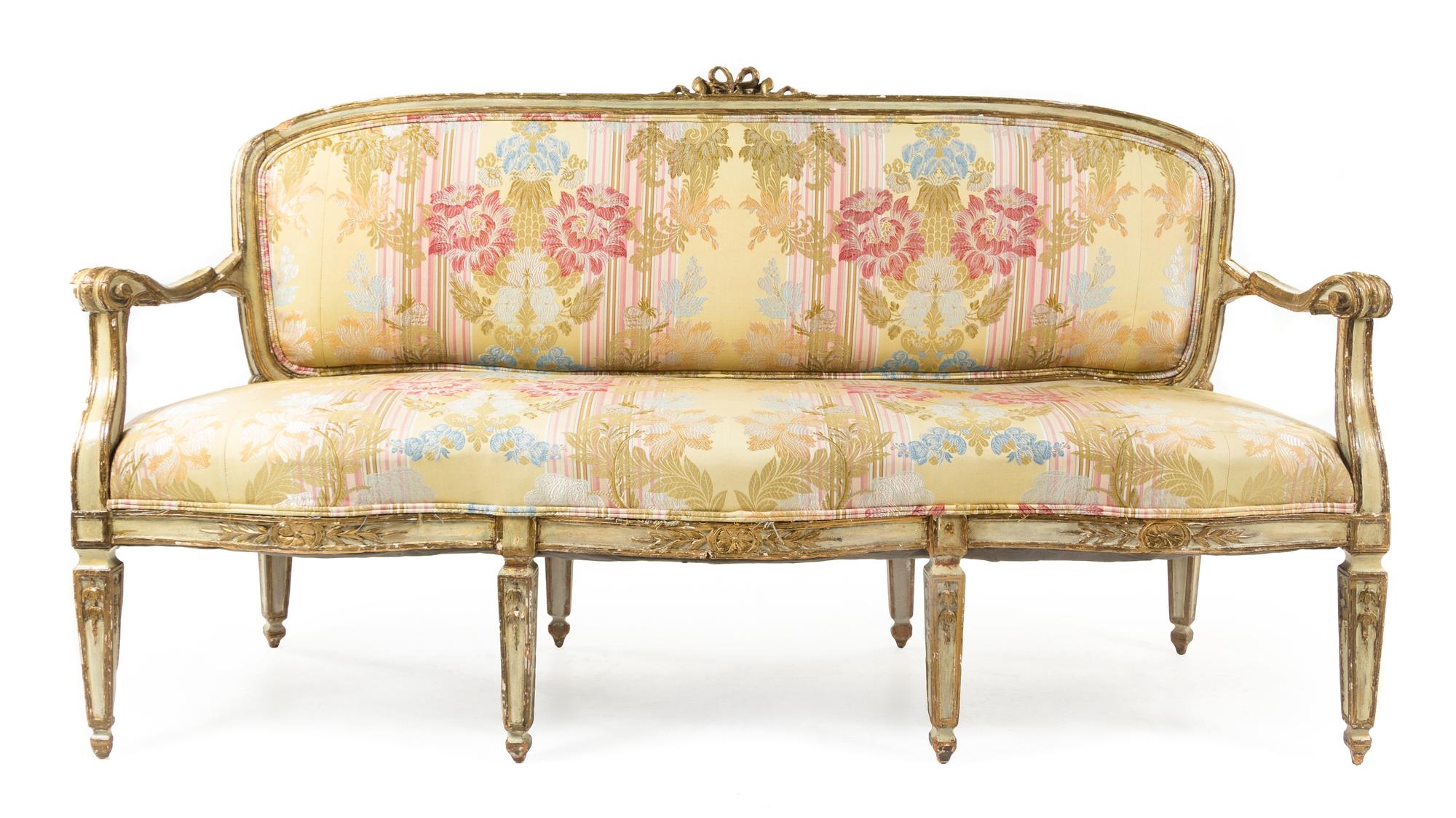 An Italian Painted and Parcel Gilt Settee Height 37 1/2 x width 69 x depth 23 inches. — 18TH CENTURY