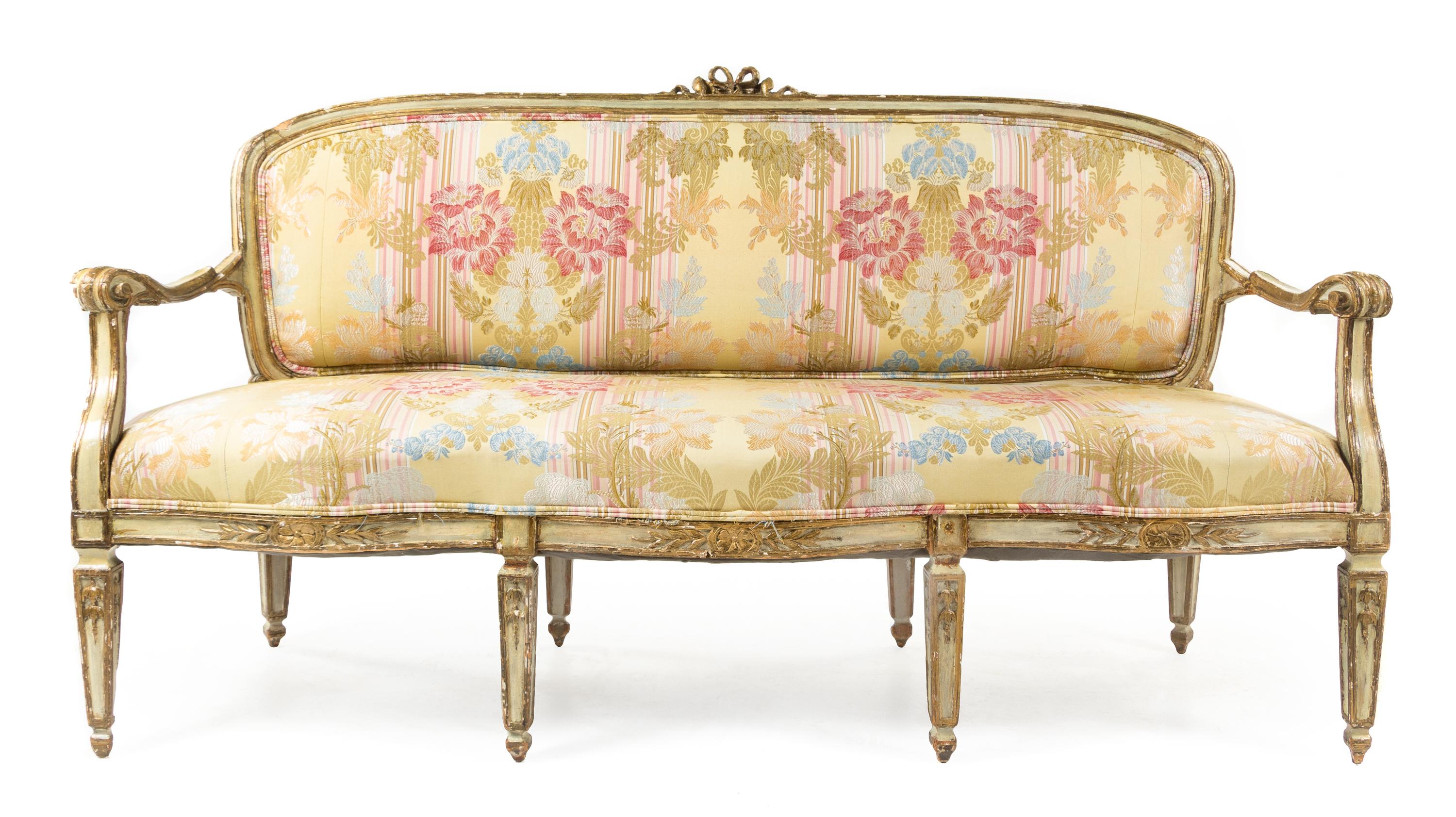An Italian Painted and Parcel Gilt Settee Height 37 1/2 x width 69 x depth 23 inches. — 18TH CENTURY