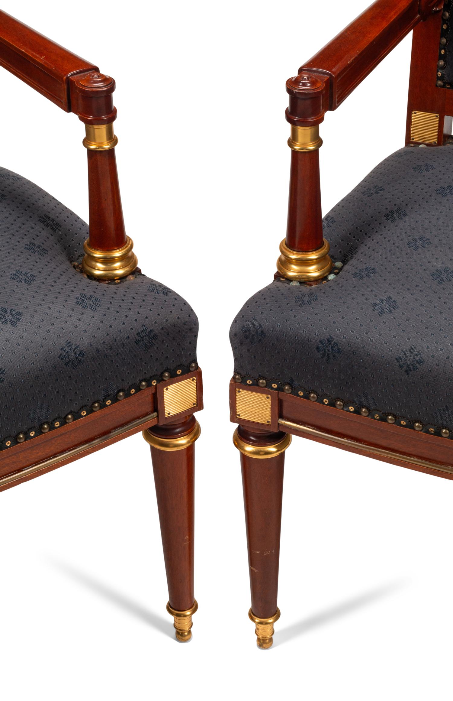 A Pair of Directoire Style Gilt Bronze Mounted Mahogany Armchairs