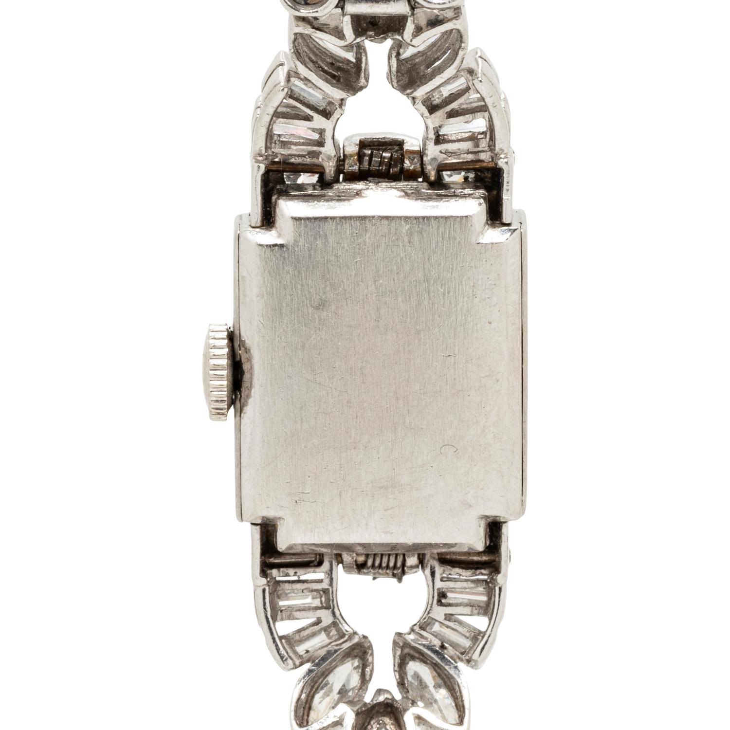 HAMILTON, PLATINUM AND DIAMOND SURPRISE WATCH