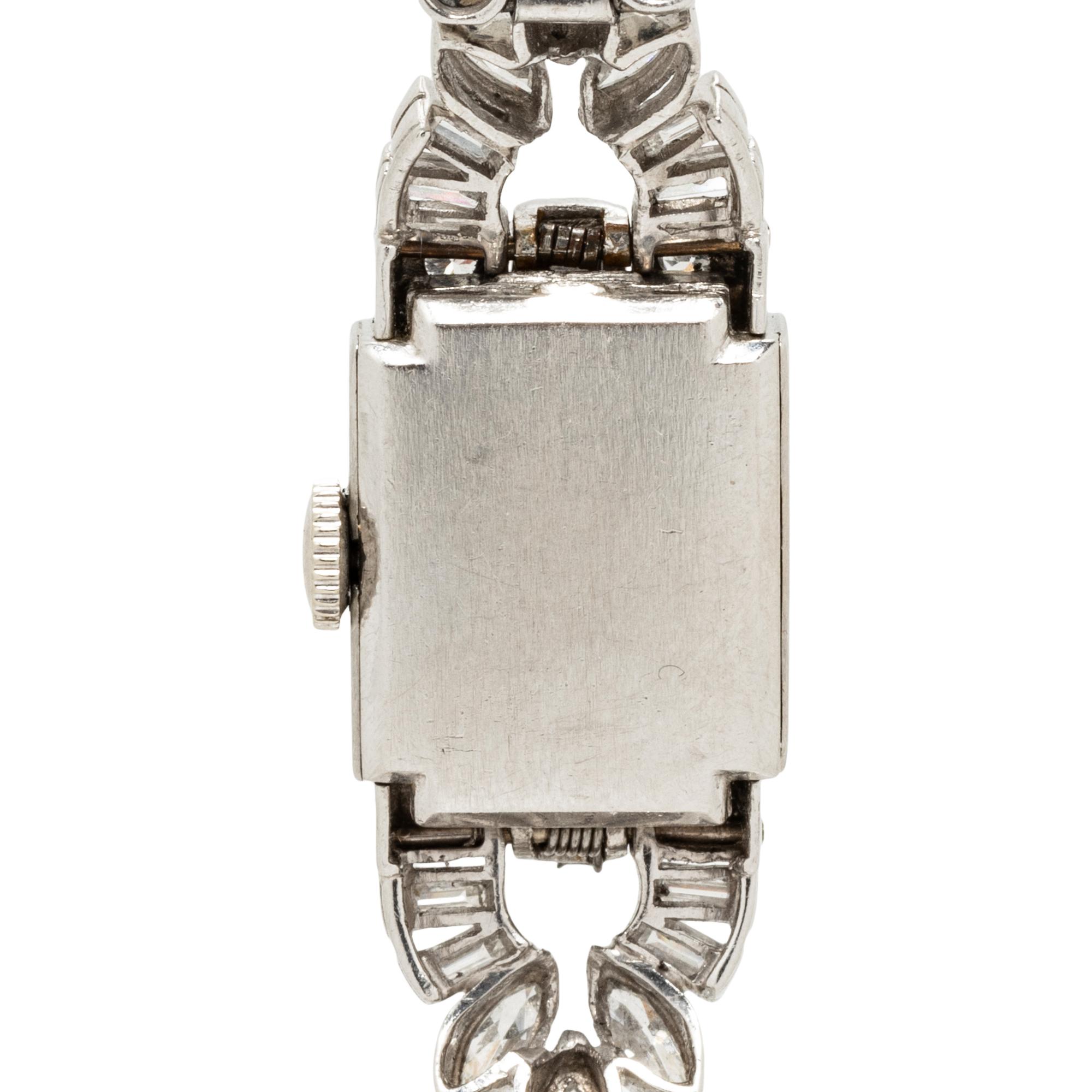 HAMILTON, PLATINUM AND DIAMOND SURPRISE WATCH