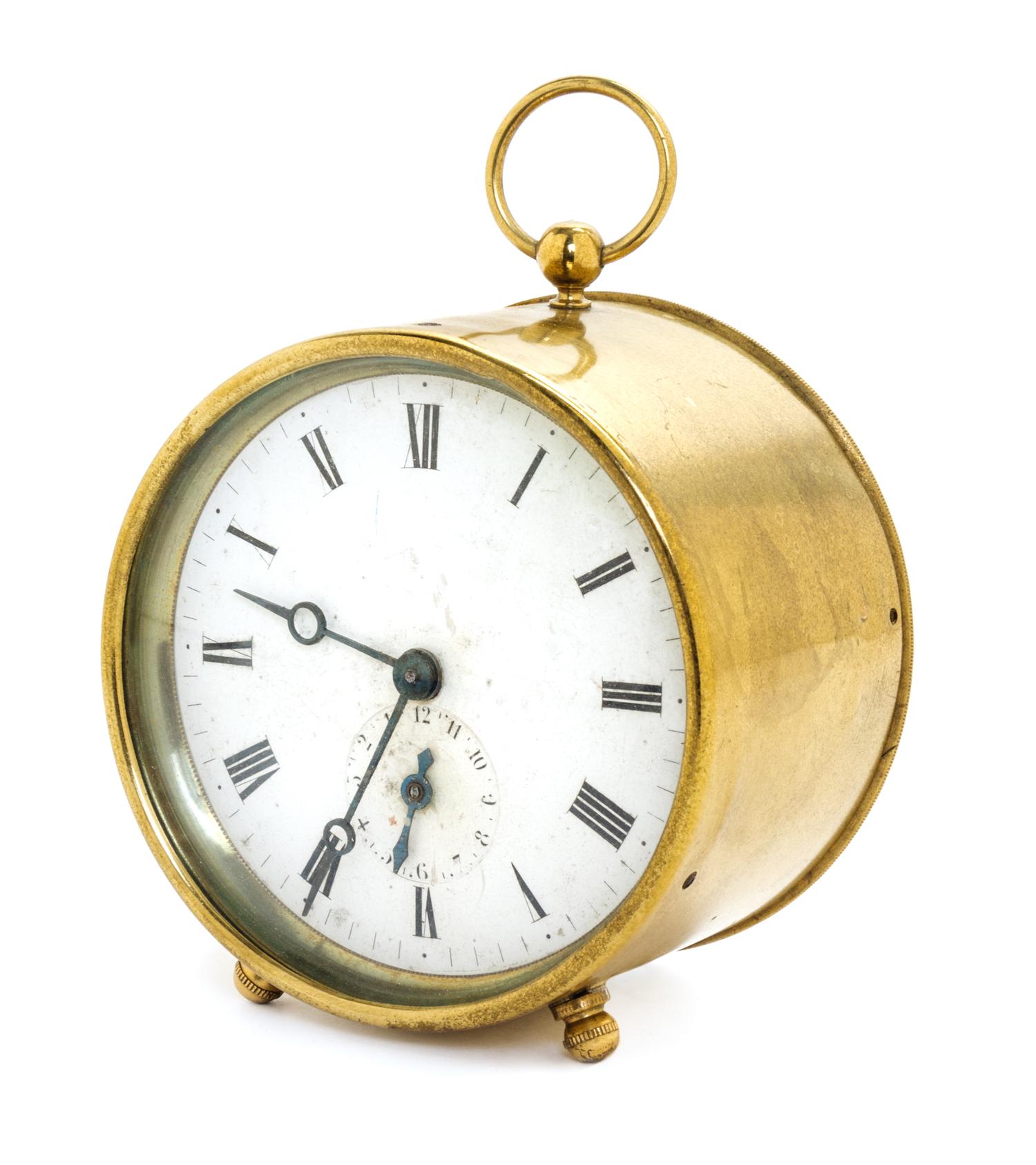 A French Brass Cylinder Clock Diameter 3 1/2 inches. — 19TH CENTURY