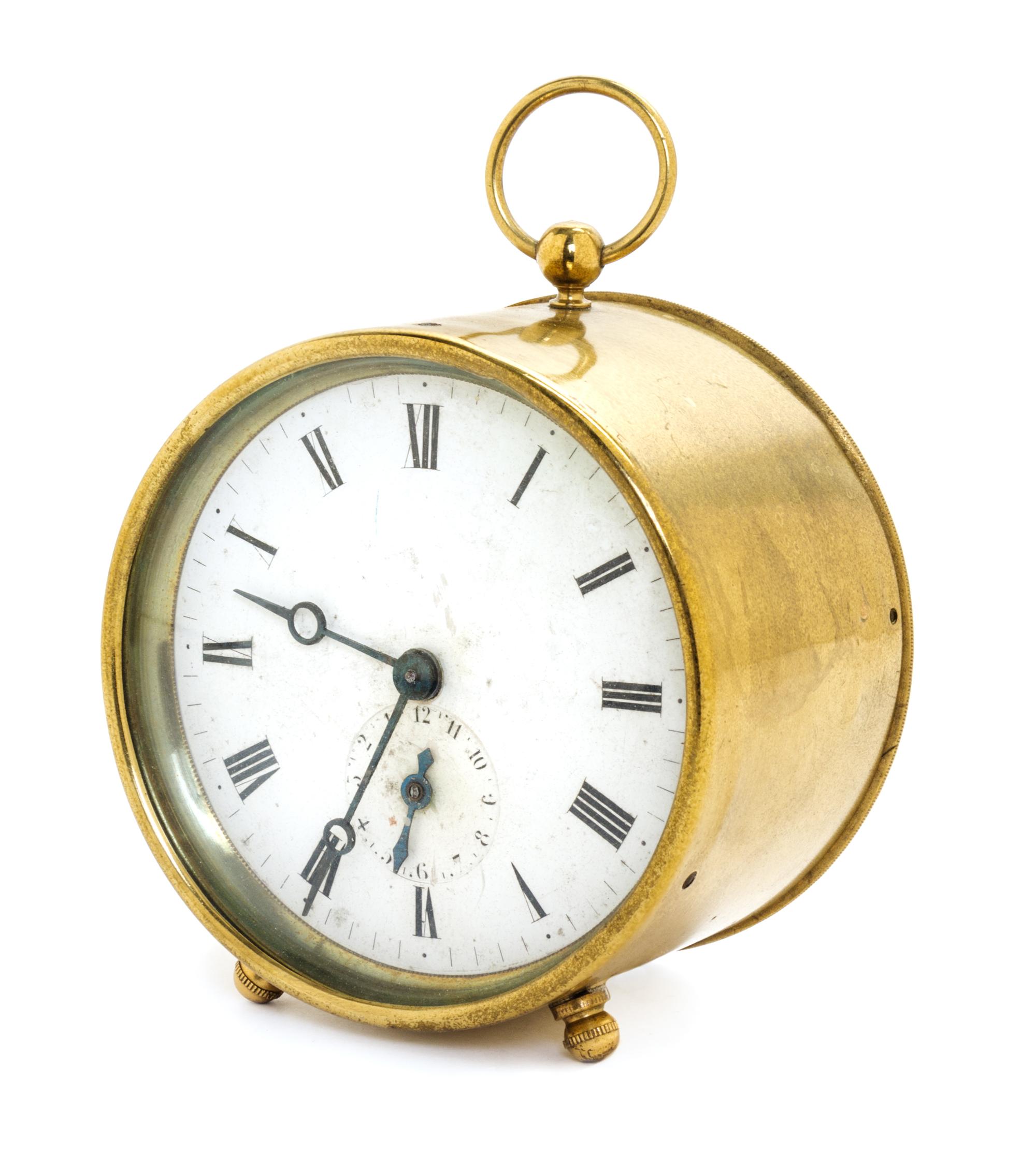 A French Brass Cylinder Clock Diameter 3 1/2 inches. — 19TH CENTURY