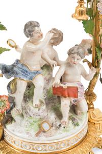A Pair of French Gilt Bronze and Porcelain Figural Four-Light Candelabra