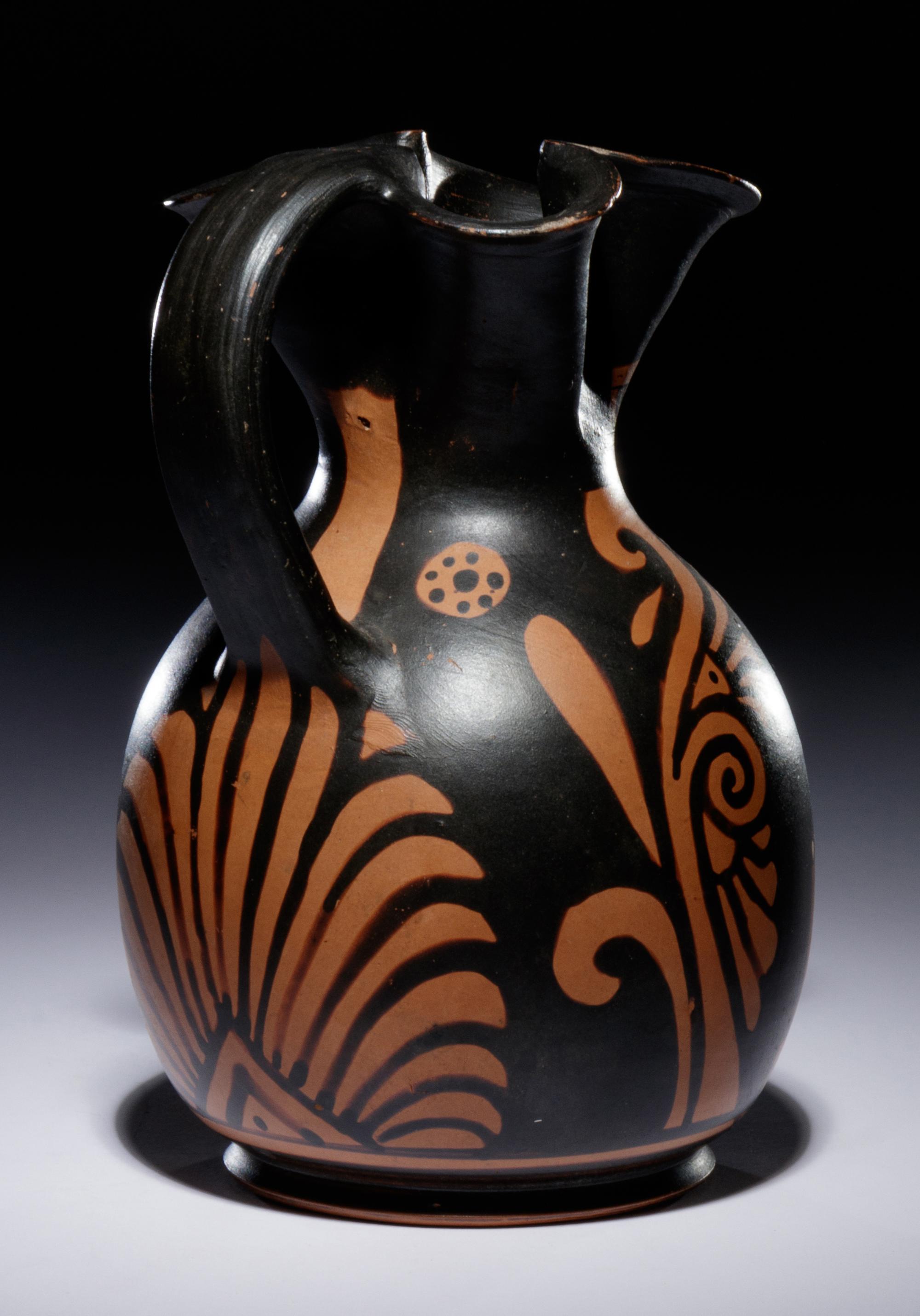 A Paestan Red-Figured Trefoil Oinochoe with a Standing Male Figure