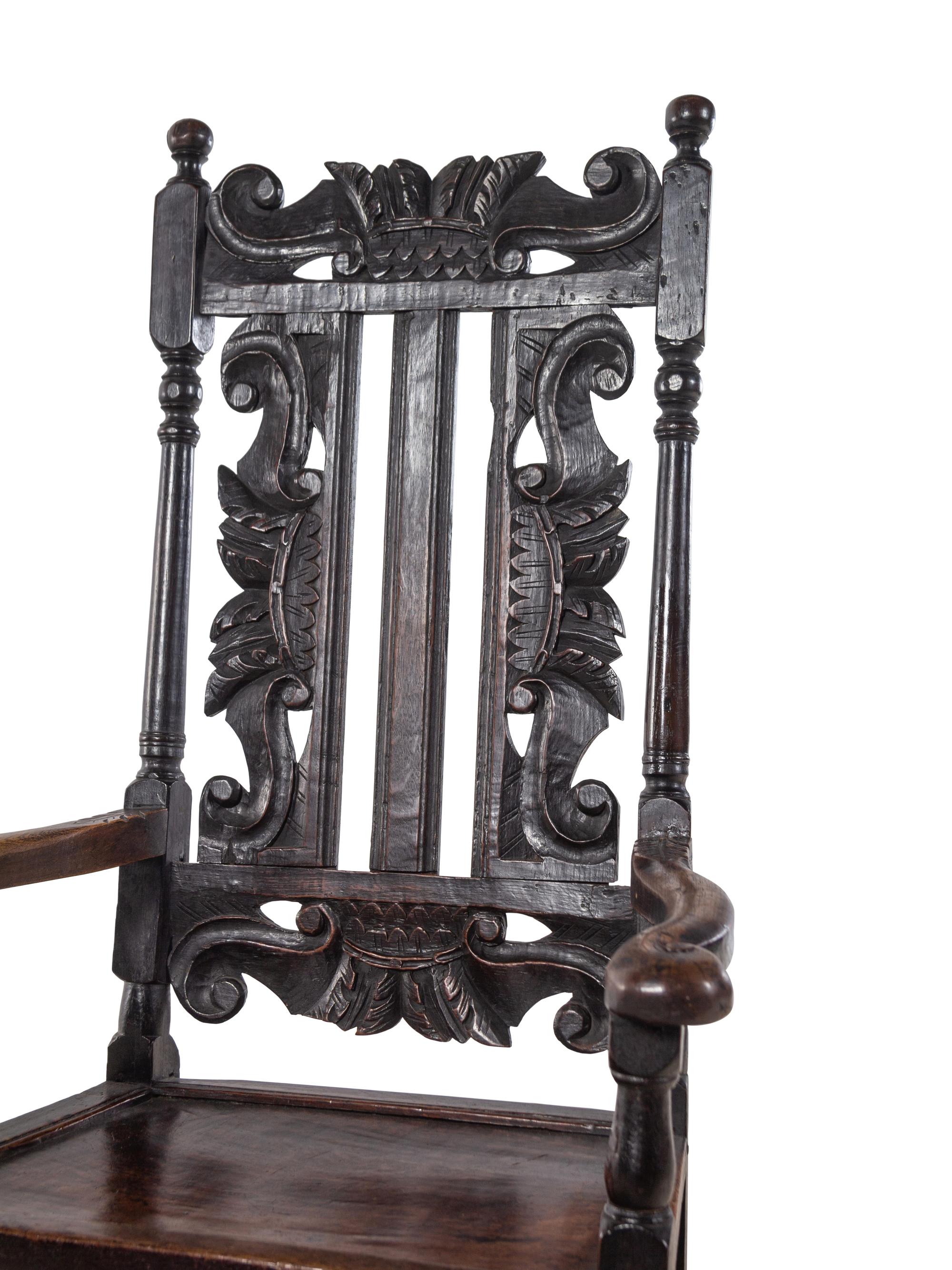 A William and Mary Carved Oak Armchair