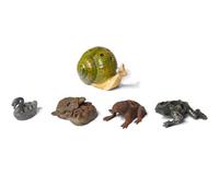 A Large Collection of Thirty-Seven Flower Frogs or Holders