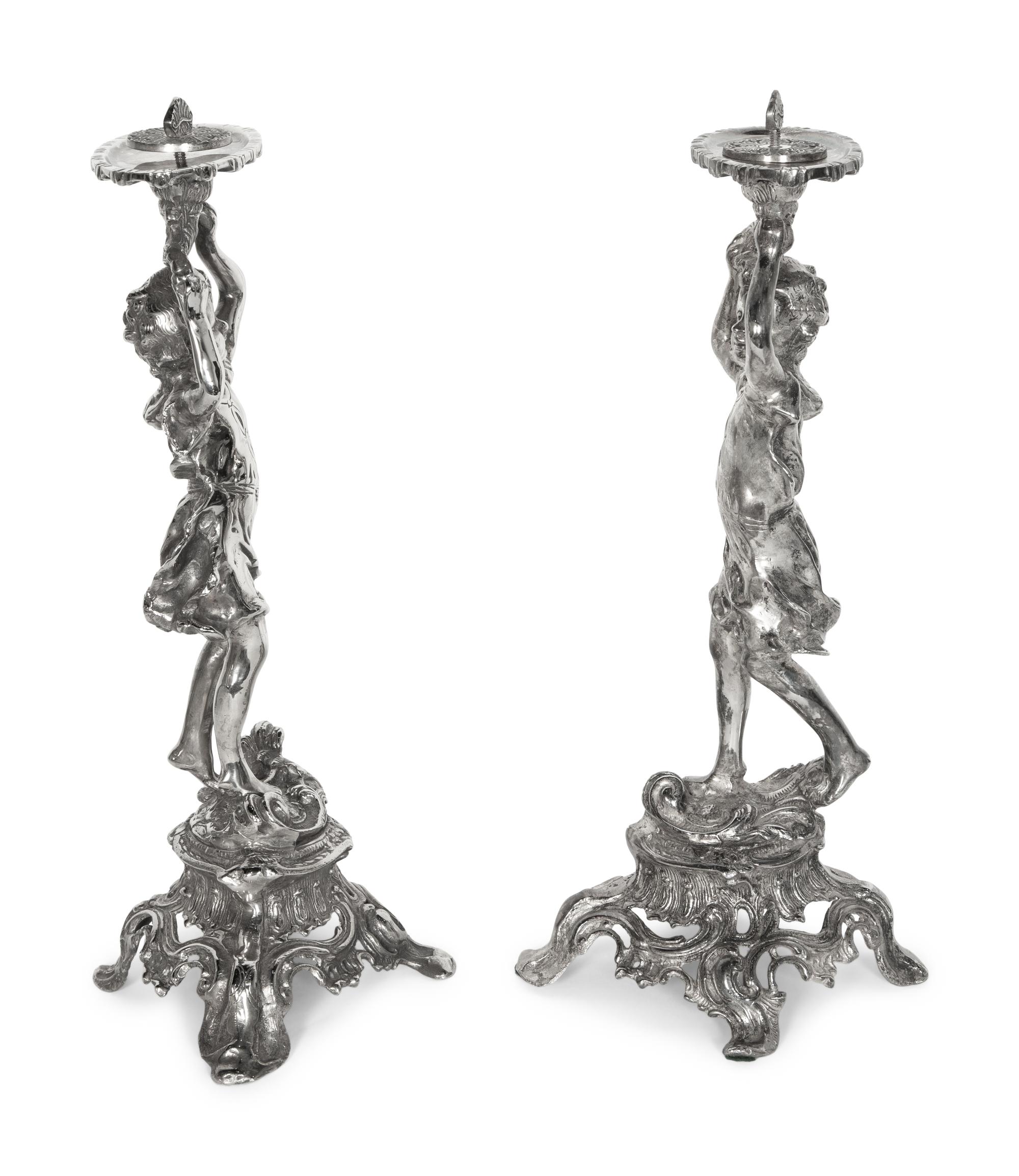 A Pair of Silvered Metal Figures