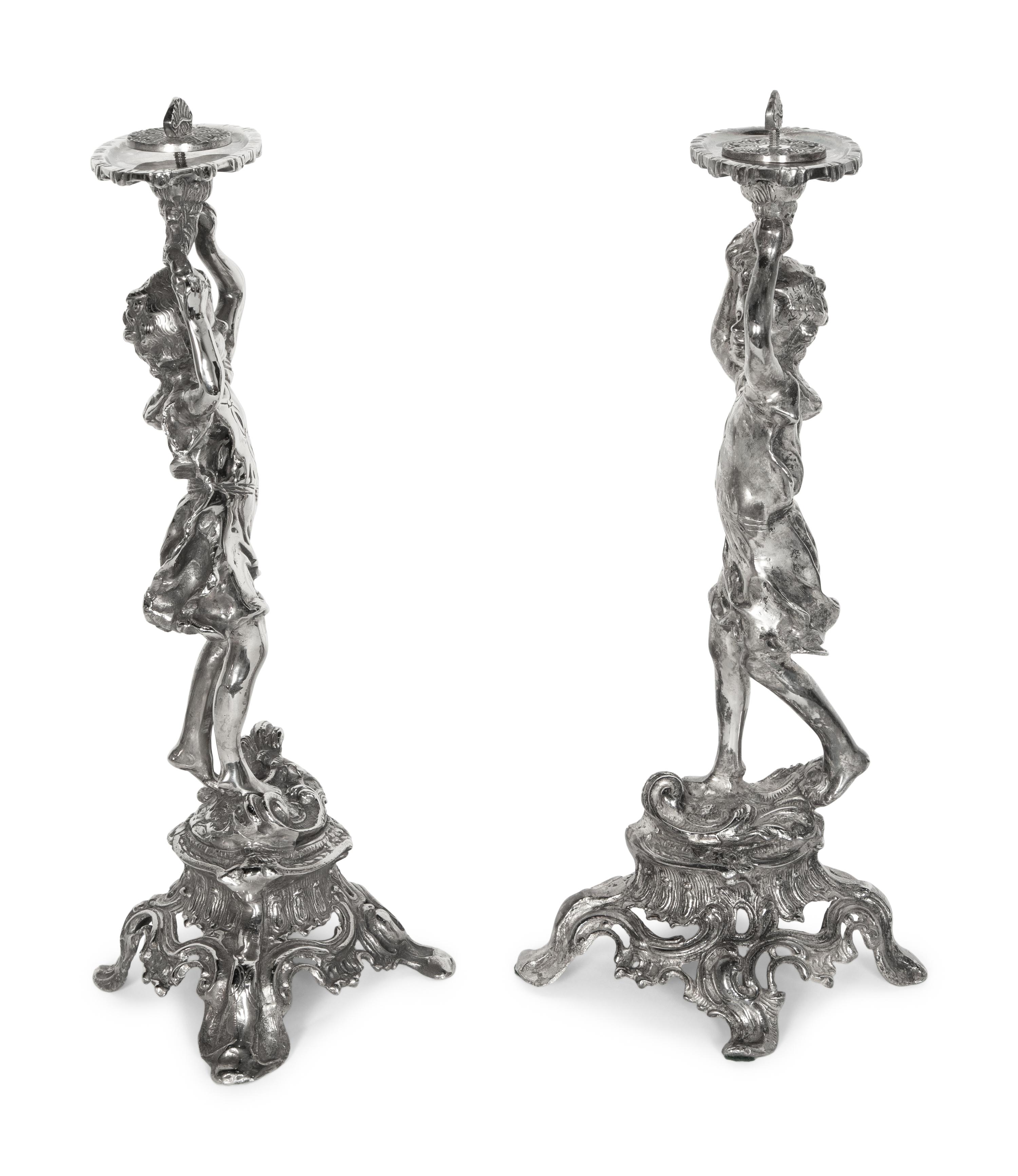 A Pair of Silvered Metal Figures