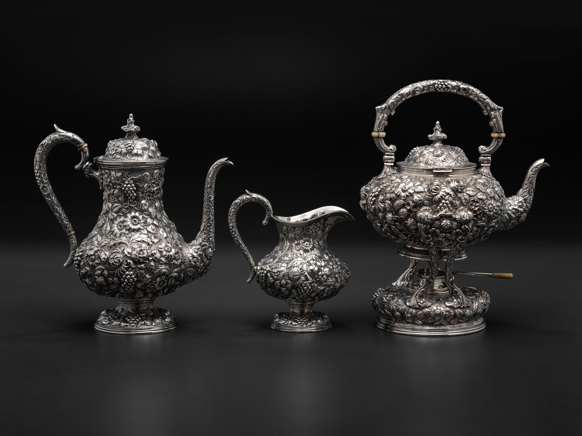 An American Repousse Silver Six-Piece Tea and Coffee Service