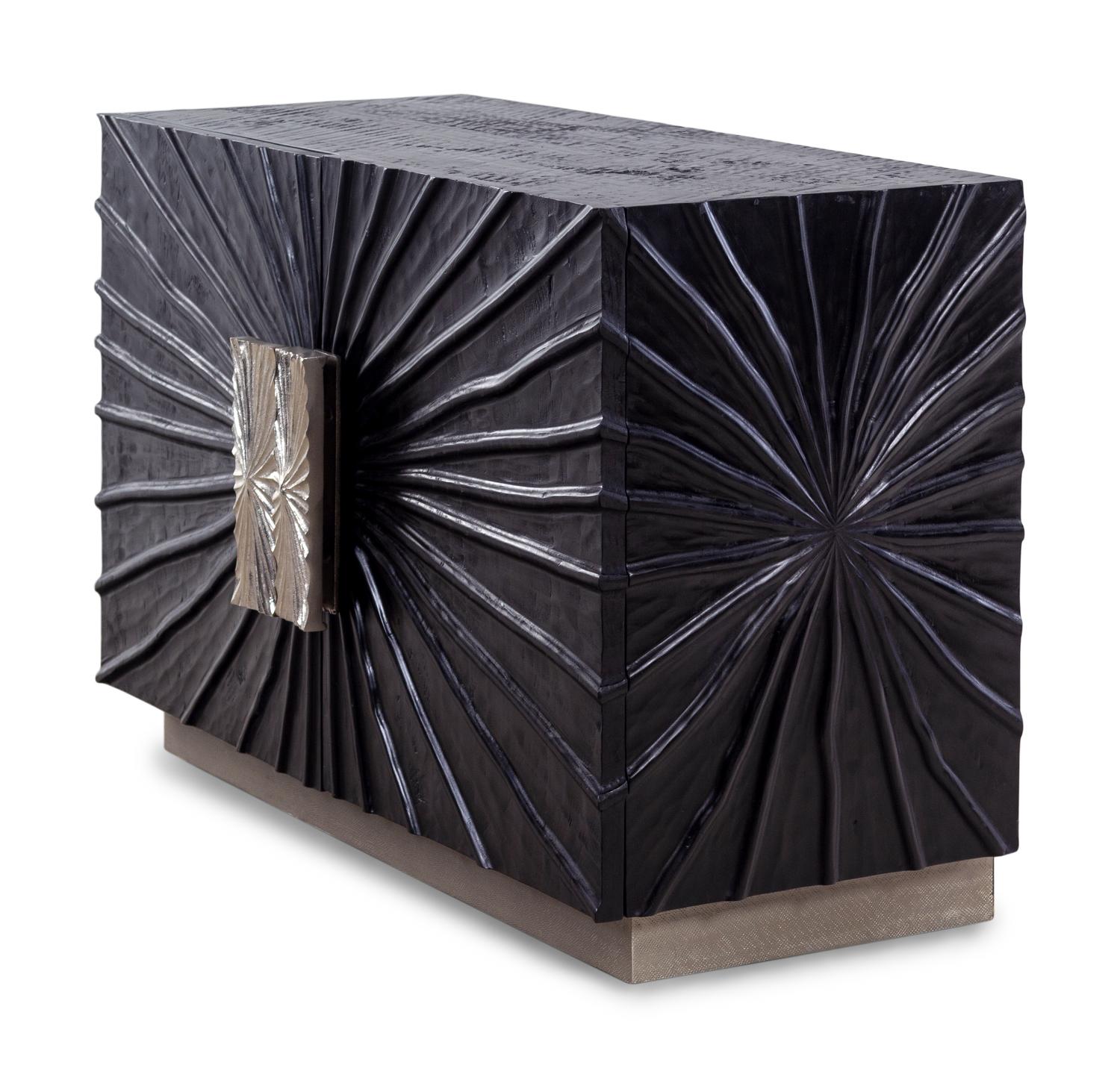 A Contemporary Ebonized Sculpture-Front Cabinet
