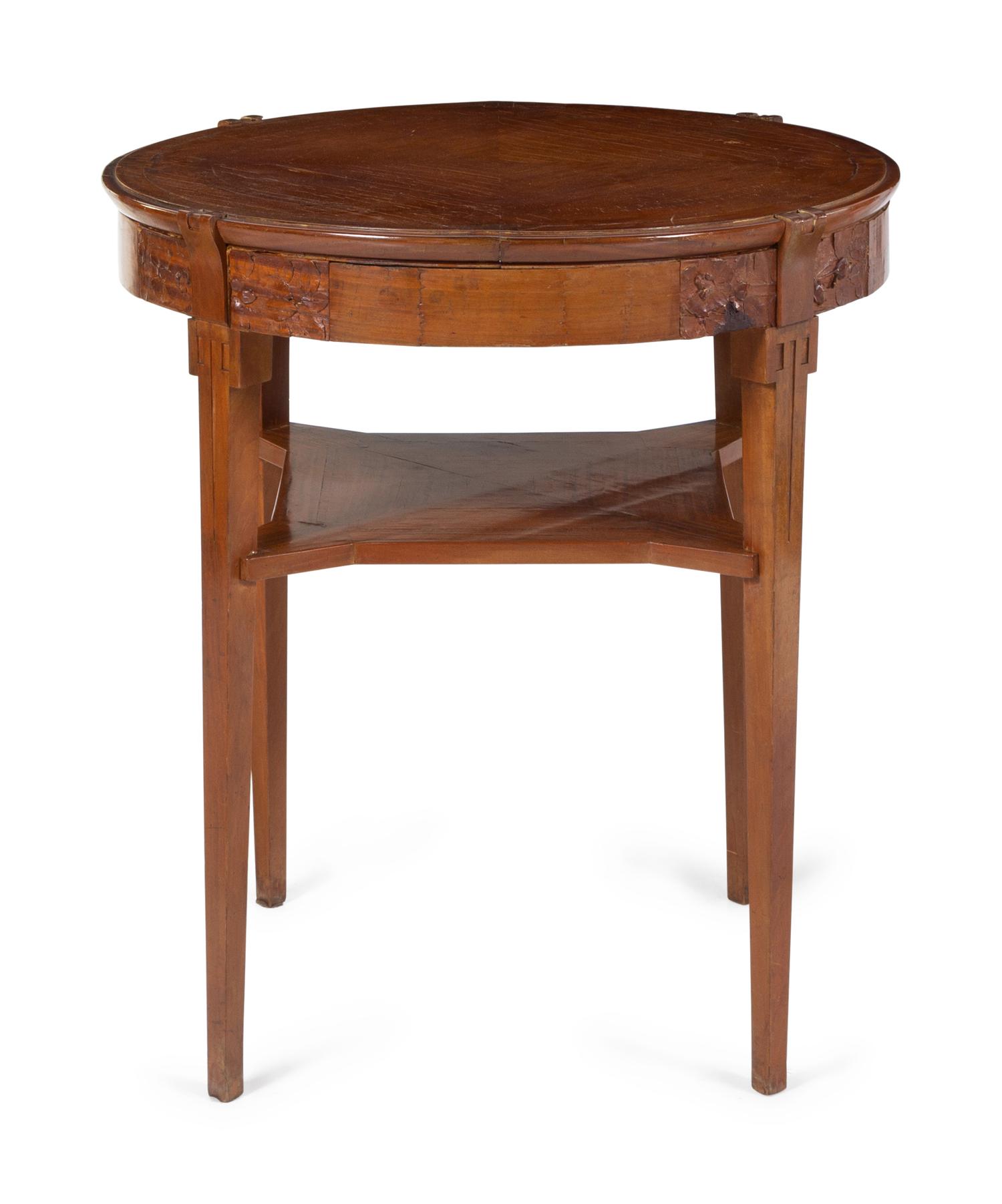 A Late Art Nouveau Table and Chairs