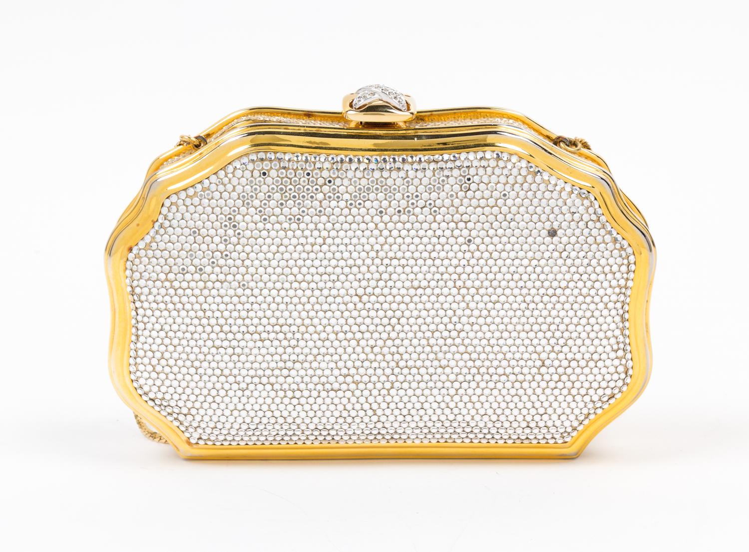 A Judith Leiber Clear Crystal Minaudiere, 7" x 4.25" x 1".