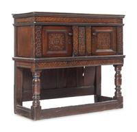 A Jacobean Carved Oak Court Cupboard
