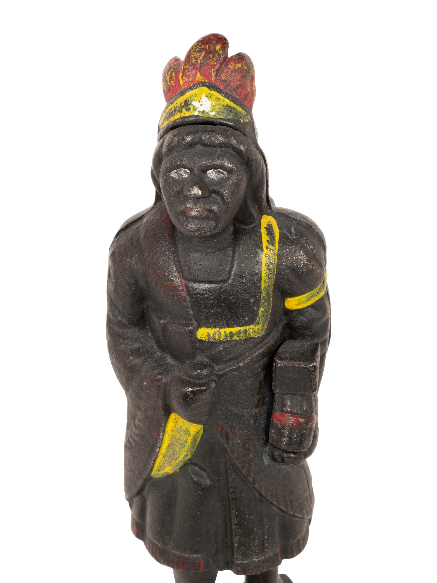 An Old Honesty Cast Iron Indian Cigar Bank, PLUS