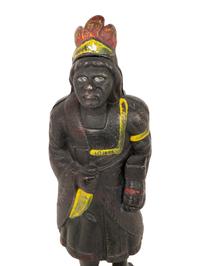 An Old Honesty Cast Iron Indian Cigar Bank, PLUS