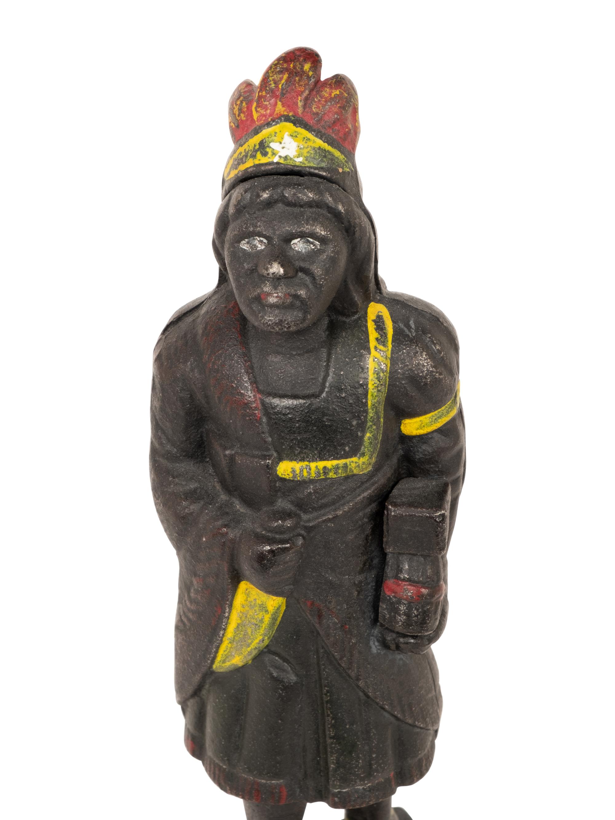 An Old Honesty Cast Iron Indian Cigar Bank, PLUS