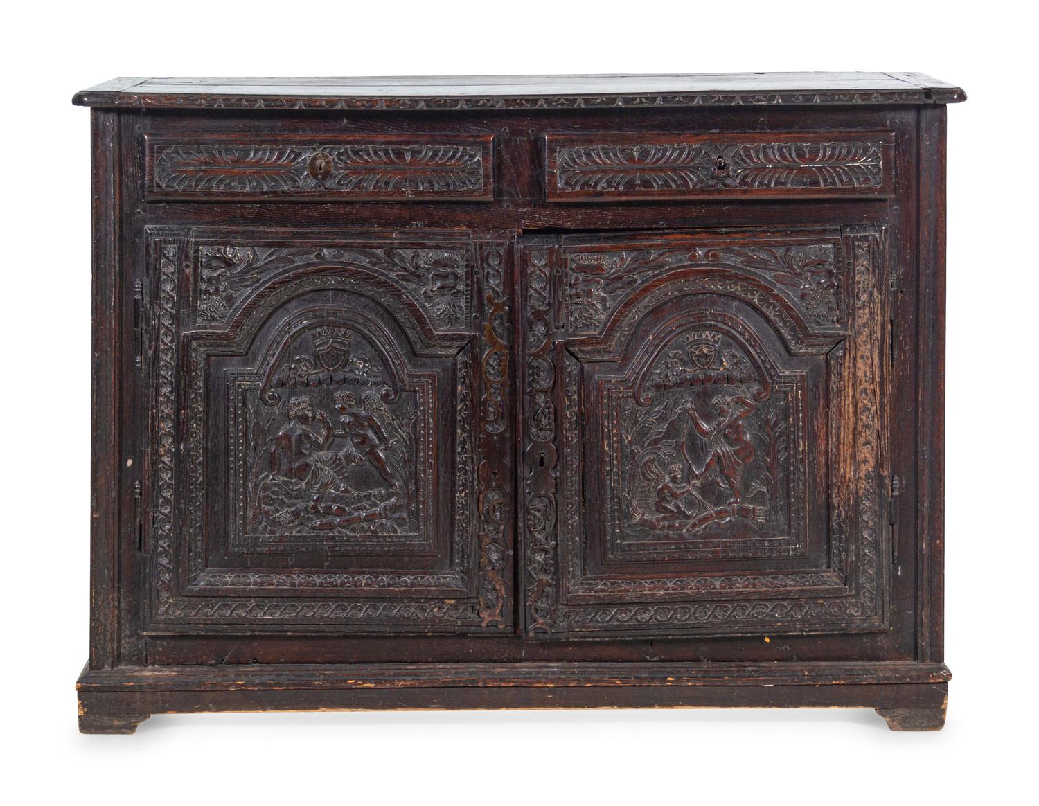 A Renaissance Style Carved Walnut Cabinet
