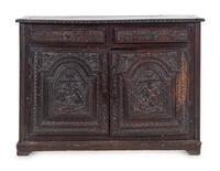 A Renaissance Style Carved Walnut Cabinet