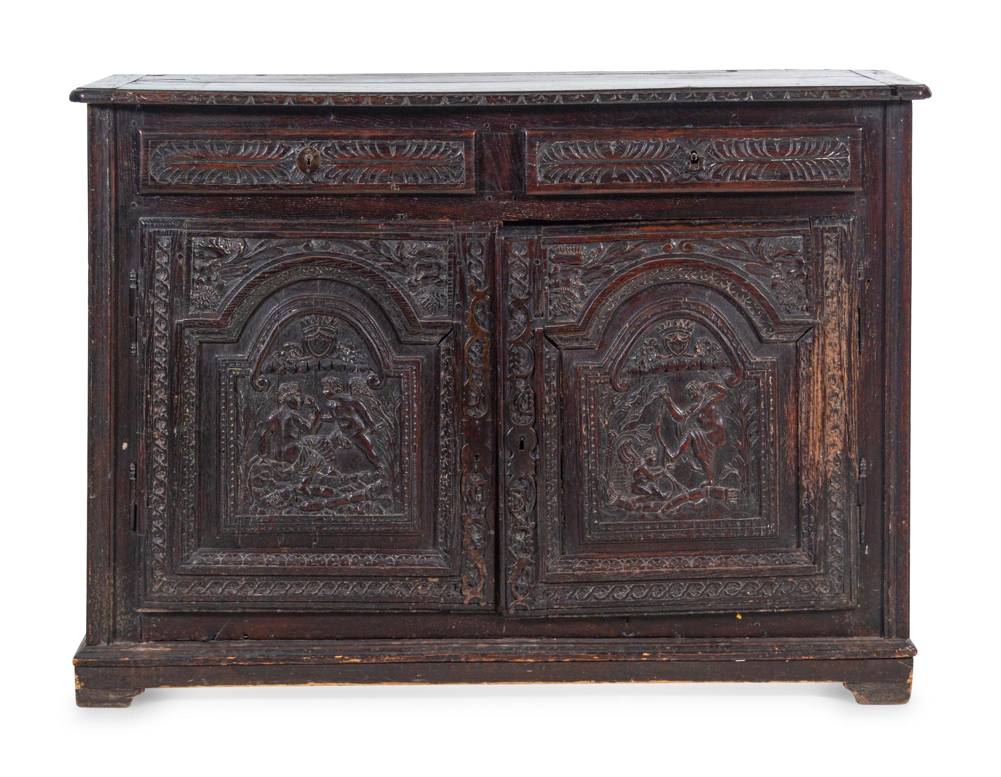 A Renaissance Style Carved Walnut Cabinet