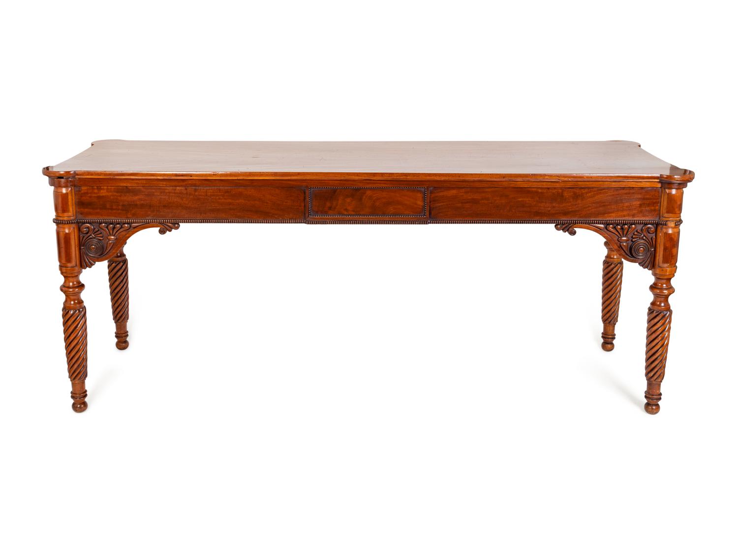 An Edwardian Carved Mahogany Ninepins Table — CIRCA 1900
