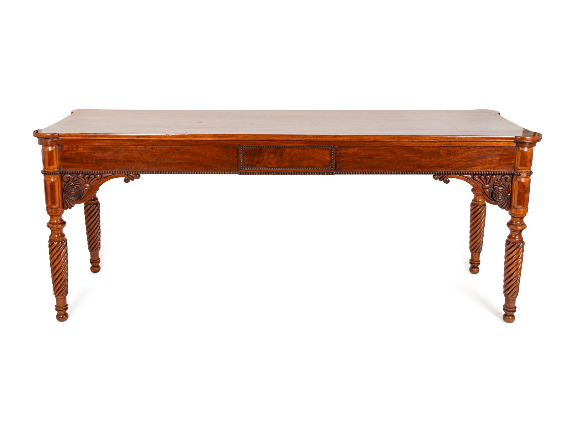 An Edwardian Carved Mahogany Ninepins Table — CIRCA 1900