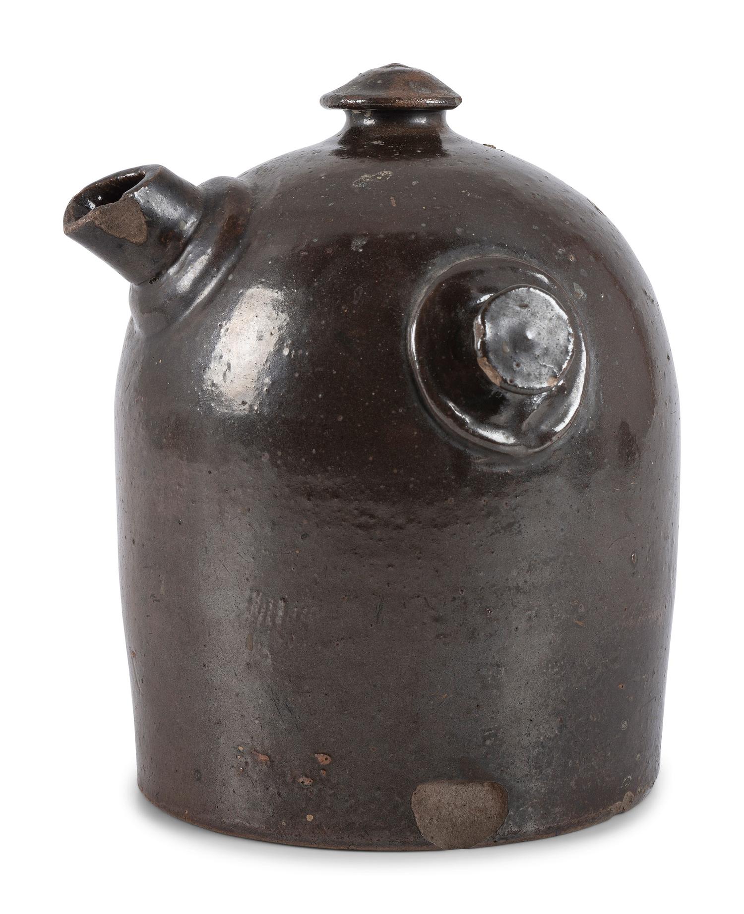 A Scrafitto Incised Albany Slip Stoneware Harvest Jug