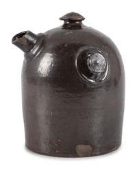 A Scrafitto Incised Albany Slip Stoneware Harvest Jug