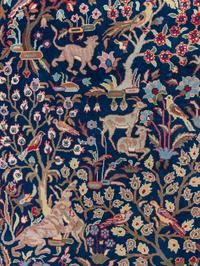 A Tabriz or Qum Wool Rug