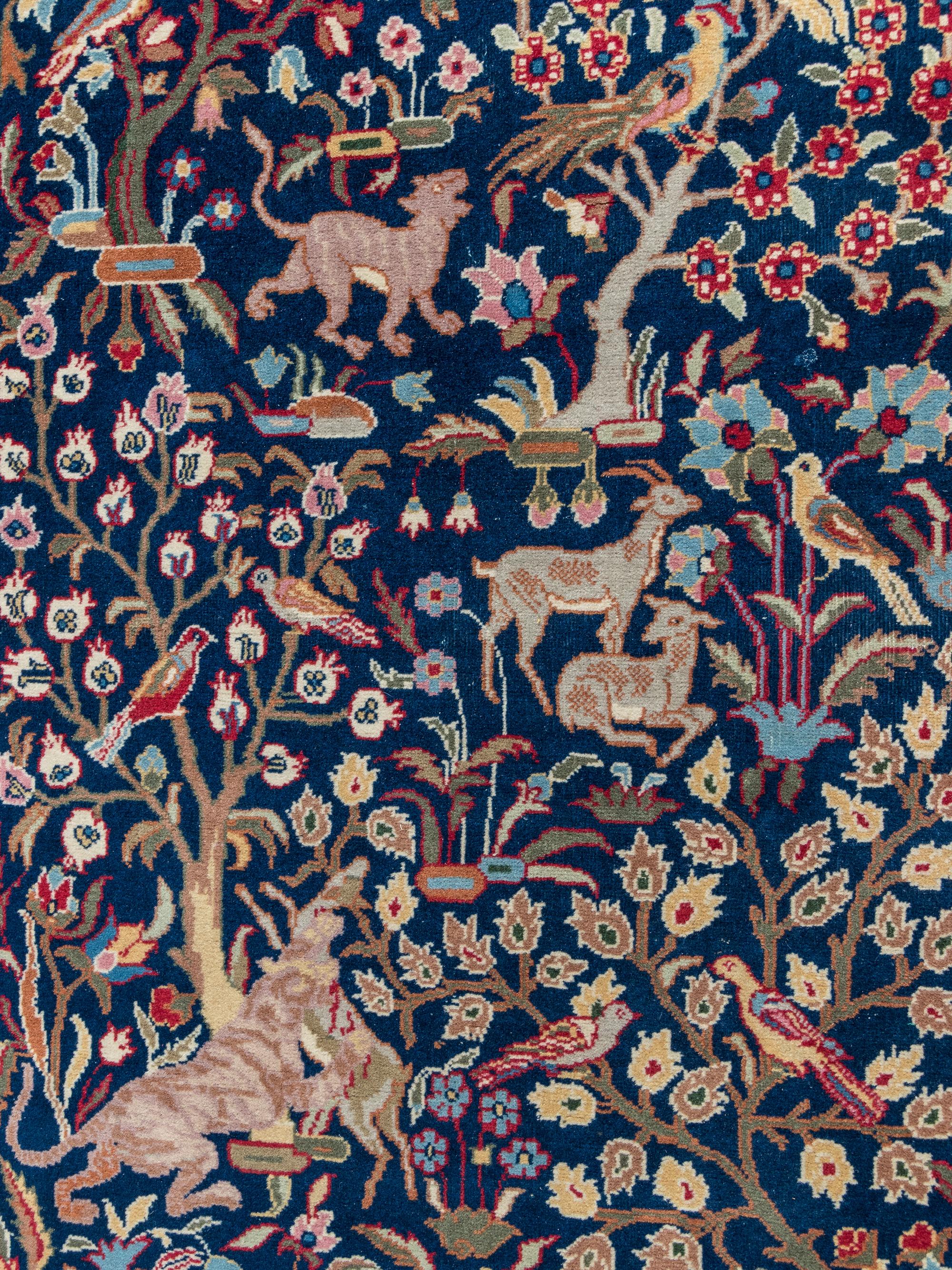 A Tabriz or Qum Wool Rug