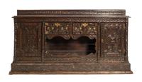 A Renaissance Revival Carved Oak Server Height 79 1/2 x width 82 1/4 x depth 21 inches.
