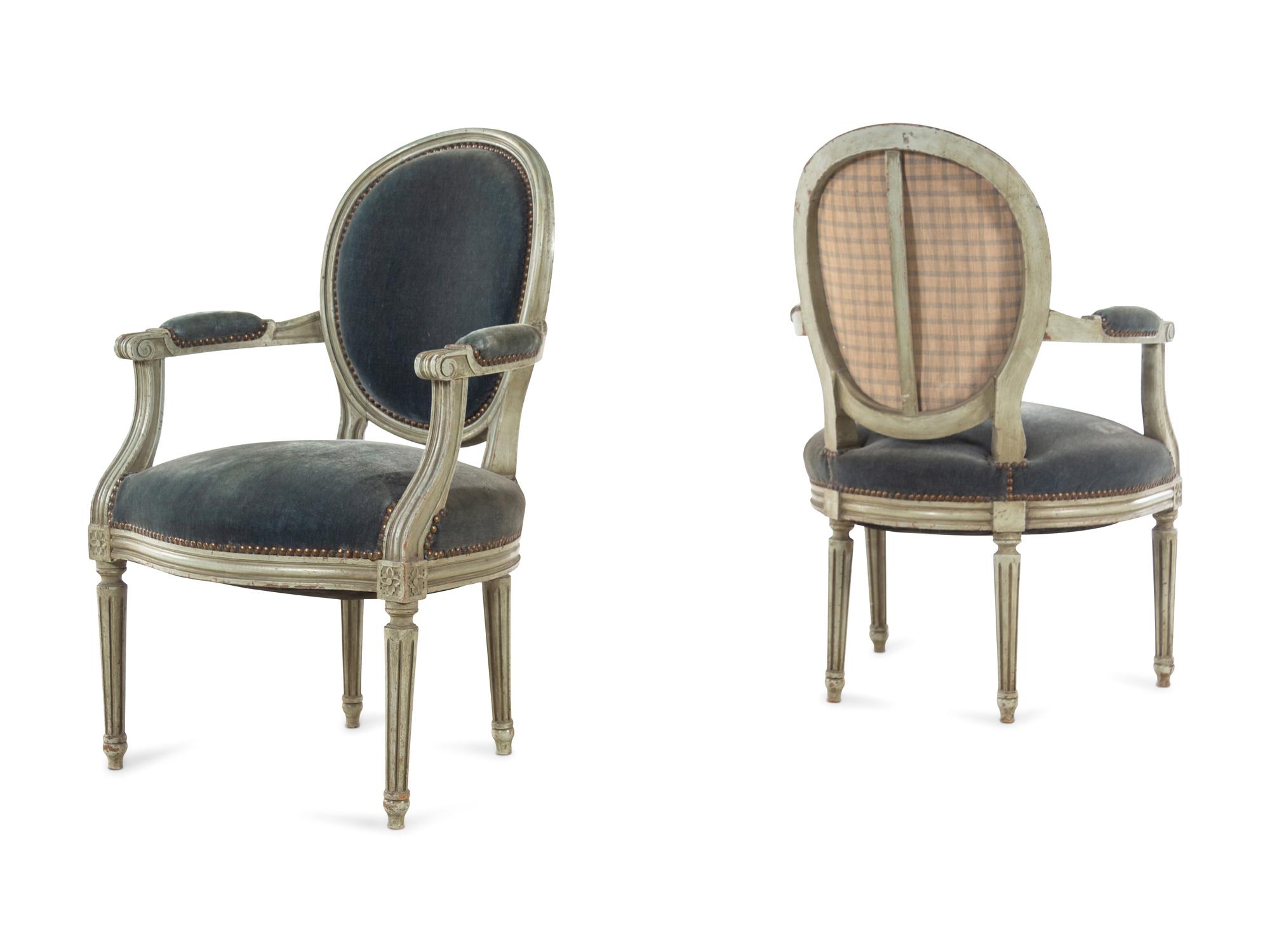 A Pair of Louis XVI Style Painted Fauteuils