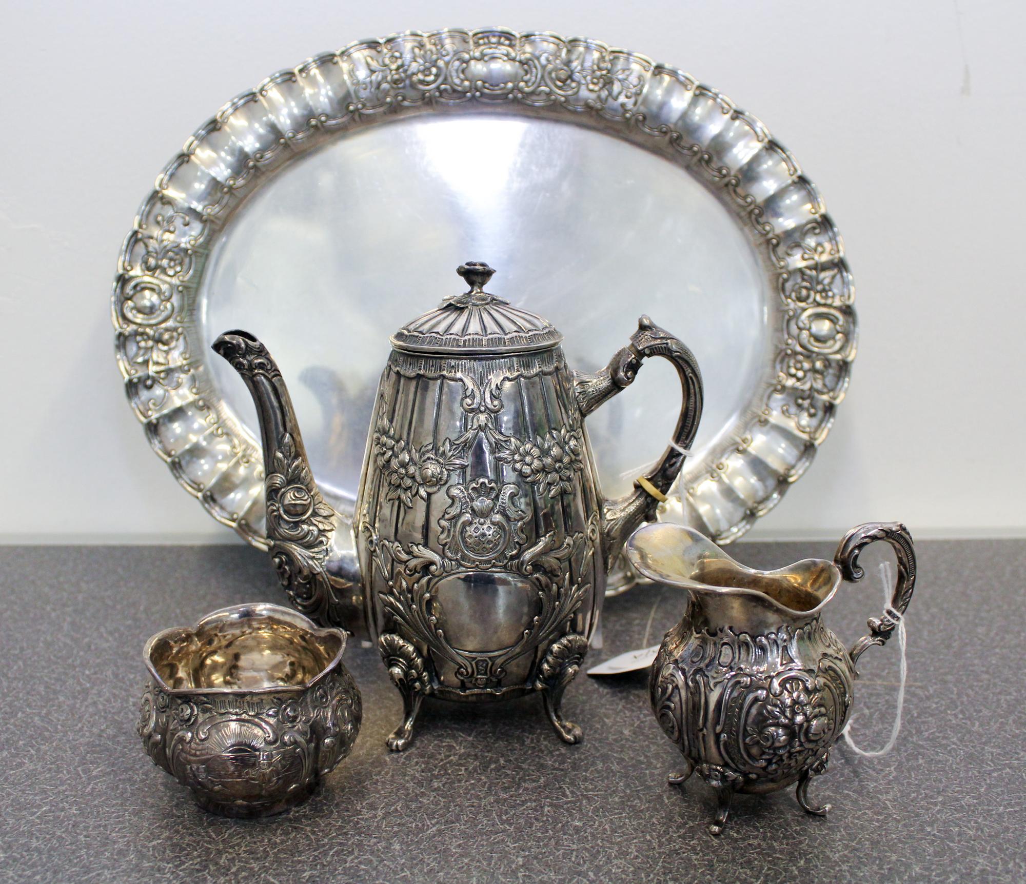 A German Silver Three Piece Tea Set Height of first 6 3/4 inches. — FIRST HALF 20TH CENTURY