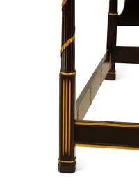 A Regency Style Ebonized and Gilt Four-Poster Bed